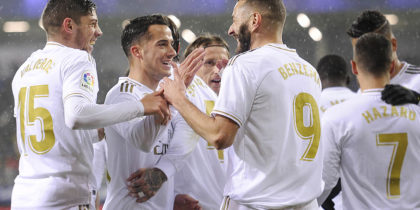 Real Madrid's French forward Karim Benzema (C) celebrates with teammates after scoring a goal during the Spanish league football match between SD Eibar and Real Madrid CF at the Ipurua stadium in Eibar on November 9, 2019. (Photo by ANDER GILLENEA / AFP) (Photo by ANDER GILLENEA/AFP via Getty Images)
