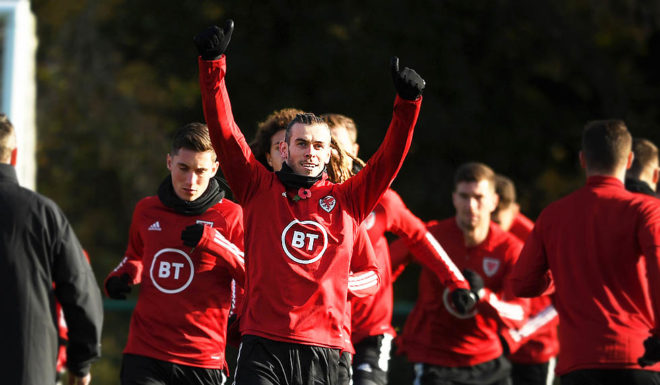 CARDIFF, WALES - NOVEMBER 11: Gareth Bale of Wales(C) reacts during a Wales Training Session at the Vale Resort on November 11, 2019 in Cardiff, Wales. (Photo by Harry Trump/Getty Images)
