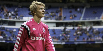 MADRID, SPAIN - APRIL 29: Martin Odegaard of Real Madrid CF leaves the pitch after his warming up before the La Liga match between Real Madrid CF and UD Almeria at Estadio Santiago Bernabeu on April 29, 2015 in Madrid, Spain. (Photo by Gonzalo Arroyo Moreno/Getty Images)