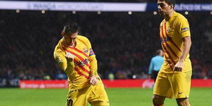 MADRID, SPAIN - DECEMBER 01: Lionel Messi of FC Barcelona celebrates after scoring his team's first goal with Luis Suarez during the Liga match between Club Atletico de Madrid and FC Barcelona at Wanda Metropolitano on December 01, 2019 in Madrid, Spain. (Photo by Denis Doyle/Getty Images)