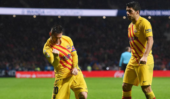MADRID, SPAIN - DECEMBER 01: Lionel Messi of FC Barcelona celebrates after scoring his team's first goal with Luis Suarez during the Liga match between Club Atletico de Madrid and FC Barcelona at Wanda Metropolitano on December 01, 2019 in Madrid, Spain. (Photo by Denis Doyle/Getty Images)