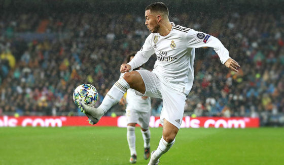 MADRID, SPAIN - NOVEMBER 26: Eden Hazard of Real Madrid runs with the ball during the UEFA Champions League group A match between Real Madrid and Paris Saint-Germain at Bernabeu on November 26, 2019 in Madrid, Spain. (Photo by Angel Martinez/Getty Images)