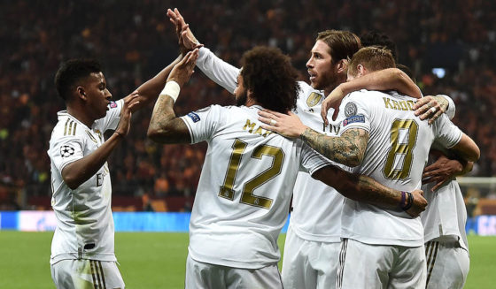 Real Madrid's German midfielder Toni Kroos (R) celebrates with team mates after he scored a goal during the UEFA Champions League group A football match between Galatasaray and Real Madrid on October 22, 2019 at the Ali Sami Yen Spor Kompleksi in Istanbul. (Photo by OZAN KOSE / AFP) (Photo by OZAN KOSE/AFP via Getty Images)