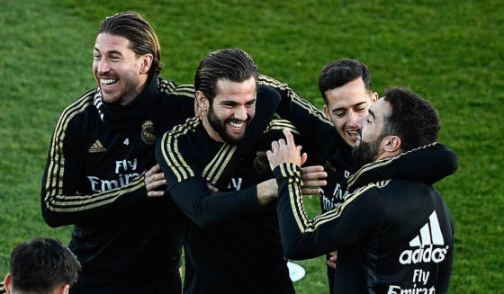 Nacho Fernández (L to R) Real Madrid's Spanish defender Sergio Ramos, Real Madrid's Spanish defender Nacho Fernandez, Real Madrid's Spanish forward Lucas Vazquez and Real Madrid's Spanish defender Dani Carvajal attend a public training session at the Ciudad Real Madrid training ground in Valdebebas, Madrid, on December 30, 2019. (Photo by OSCAR DEL POZO / AFP) (Photo by OSCAR DEL POZO/AFP via Getty Images)