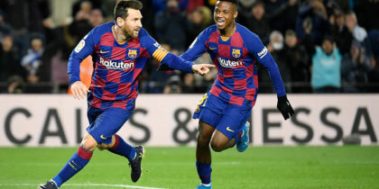 Barcelona's Argentine forward Lionel Messi (L) celebrates after scoring the opening goal during the Spanish league football match between FC Barcelona and Granada FC at the Camp Nou stadium in Barcelona on January 19, 2020. (Photo by LLUIS GENE / AFP) (Photo by LLUIS GENE/AFP via Getty Images)