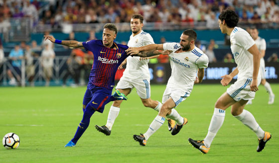 MIAMI GARDENS, FL - JULY 29: Neymar #11 of Barcelona and Karim Benzema #9 of Real Madrid vie for the ball during their International Champions Cup 2017 match at Hard Rock Stadium on July 29, 2017 in Miami Gardens, Florida. (Photo by Mike Ehrmann/Getty Images)