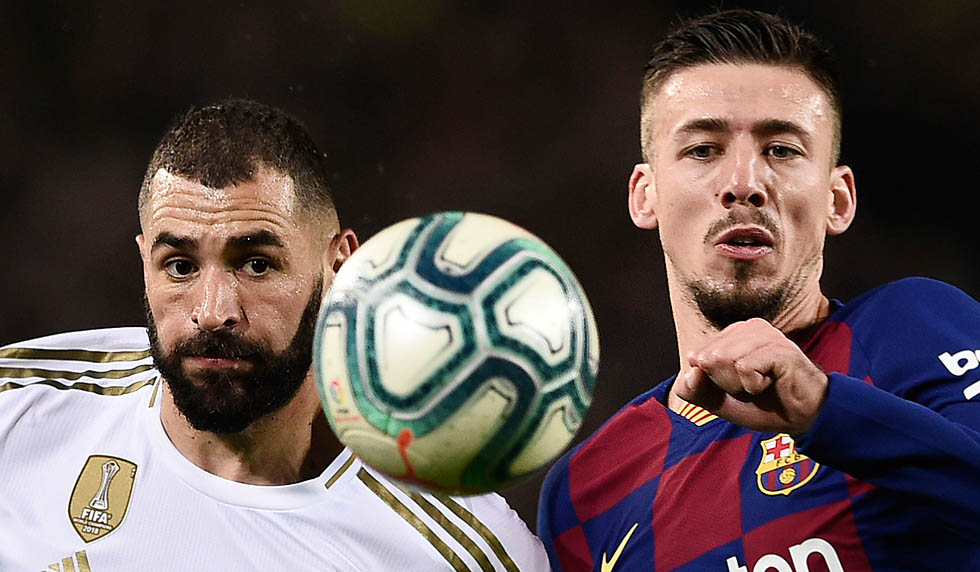 Real Madrid's French forward Karim Benzema (L) vies with Barcelona's French defender Clement Lenglet during the "El Clasico" Spanish League football match between Barcelona FC and Real Madrid CF at the Camp Nou Stadium in Barcelona on December 18, 2019, (Photo by Josep LAGO / AFP) (Photo by JOSEP LAGO/AFP via Getty Images)