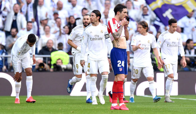 MADRID, SPAIN - FEBRUARY 01: Sime Vrsaljko of Atletico Madrid reacts to Real Madrid scoring there first goal during the La Liga match between Real Madrid CF and Club Atletico de Madrid at Estadio Santiago Bernabeu on February 01, 2020 in Madrid, Spain. (Photo by Denis Doyle/Getty Images)