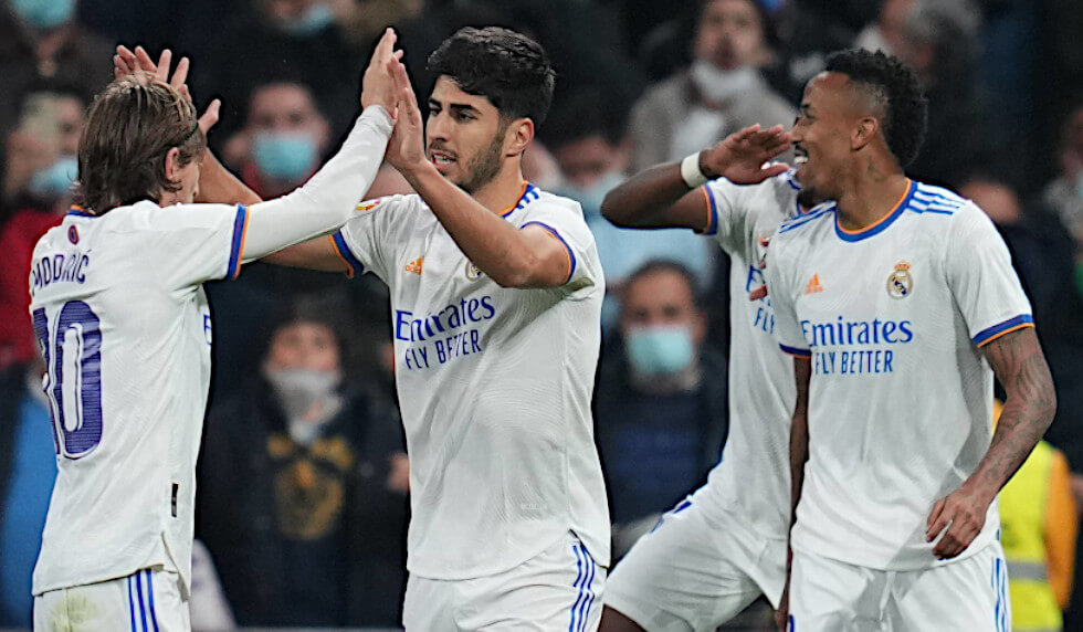 ESP: Real Madrid-Atletico de Madrid. La Liga Santander Marco Asensio of Real Madrid celebrates with his teammate Luka Modric after scoring the 2-0 during the La Liga match between Real Madrid and Atletico de Madrid played at Santiago Bernabeu Stadium on December 12, 2021 in Madrid, Spain.